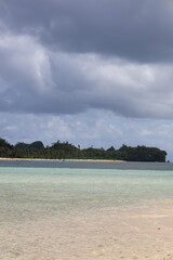 Kawhagan island view surrounded by turquoise water as a second stop of Island Hopping tour in Siargao