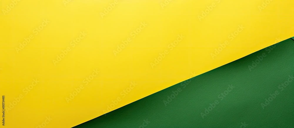 Wall mural top view of a vibrant green and yellow paper background with ample copy space for adding images or t