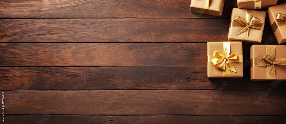 Leinwandbilder Top view of gift boxes on a wooden background with ample space for adding images or text