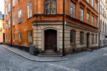 Sweden quaint cobblestone street in picturesque Gamla Stan, Stockholm's oldest neighborhood.