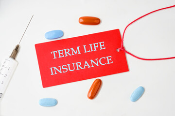 Medical concept. TERM LIFE INSURANCE on a red card with a rope on a white background