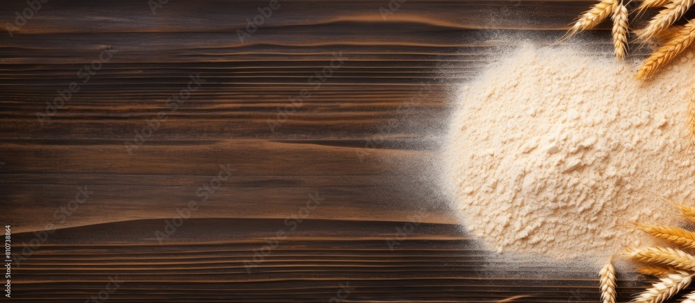 Aufkleber Top view of a wooden table with a sprinkling of wheat flour and ample space for text at the side Original Sprinkled wheat flour on wooden table with empty space for text top view