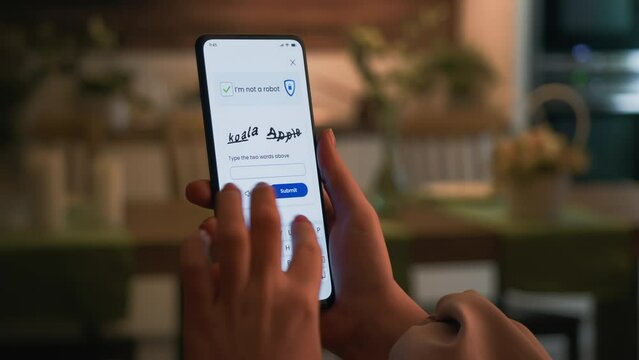 Completing CAPTCHA verification on a smartphone. Proving not to be a bot.