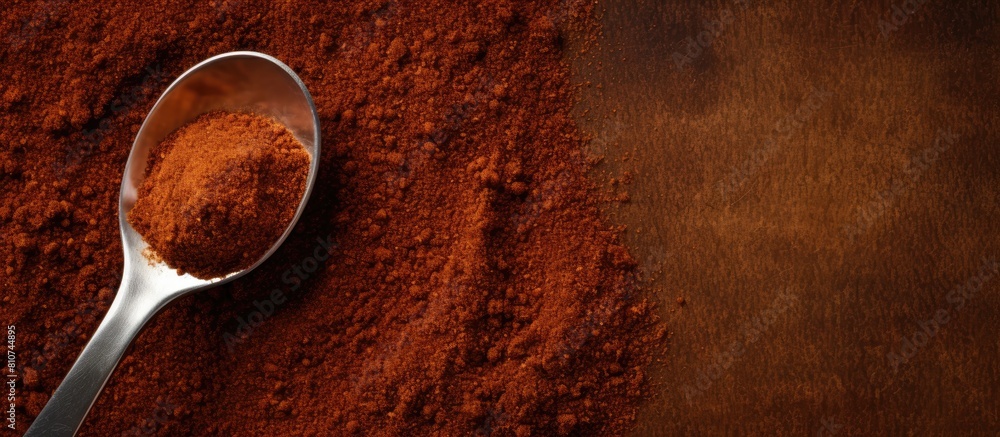 Poster A top view of a spoon with coffee powder creating a visually appealing copy space image