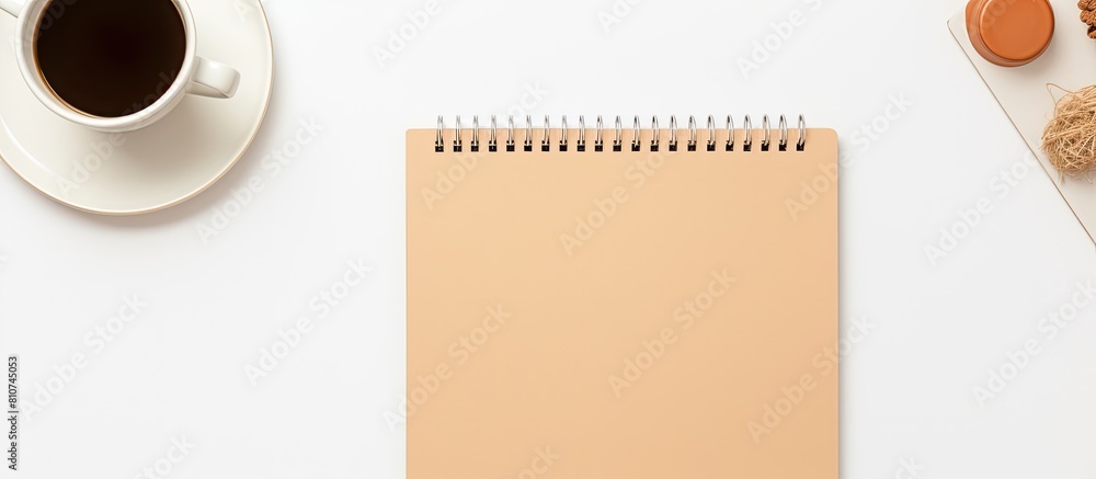 Aufkleber cream background with top view of workbook and stationary mockups including copy space image