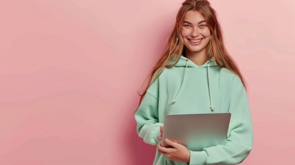 Smiling Person with a Laptop
