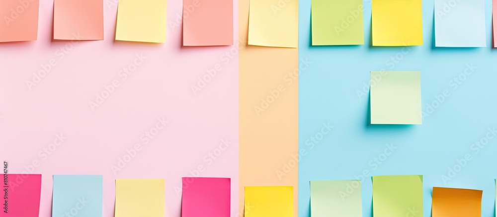 Fototapete A minimal style flat lay with colorful sticky notes on a pastel background The image provides ample copy space and is captured from a top view