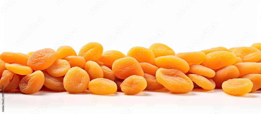Poster A copy space image of dried apricots displayed on a white background