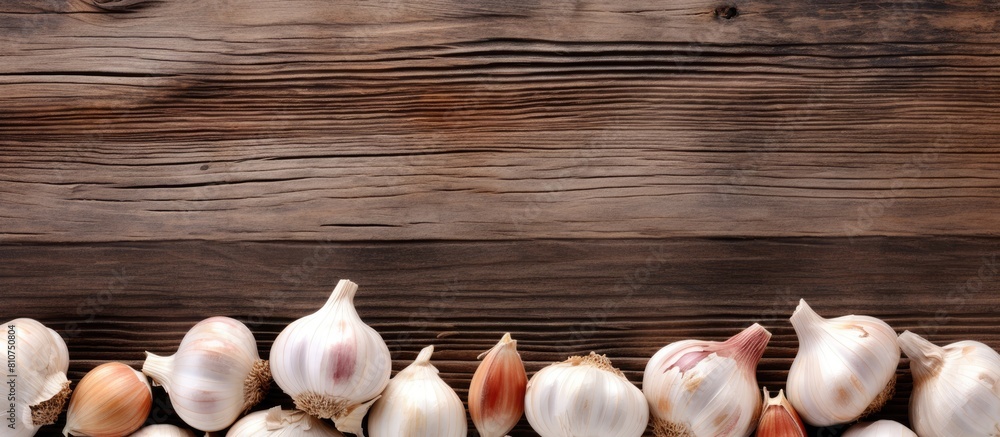 Aufkleber A copy space image of garlic and garlic cloves arranged on a rustic wooden table emphasizing the idea of a healthy lifestyle