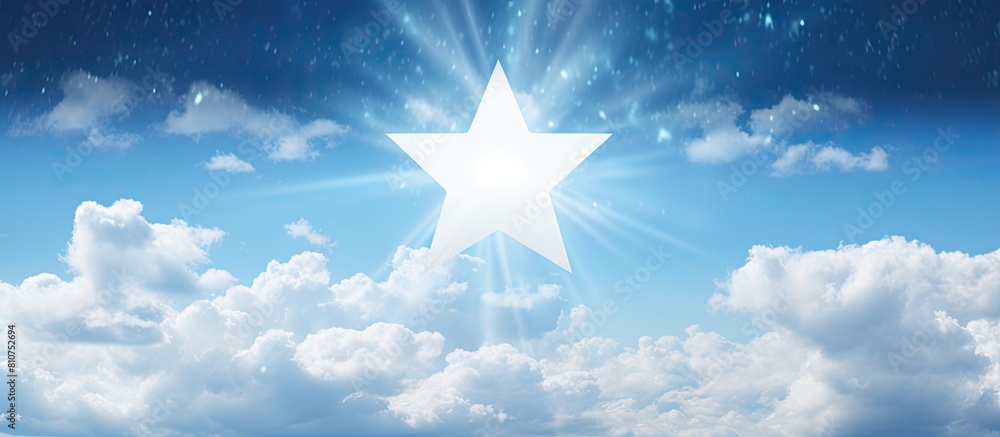 Poster The word star is written against a backdrop of a cloud filled sky The image features ample empty space for text