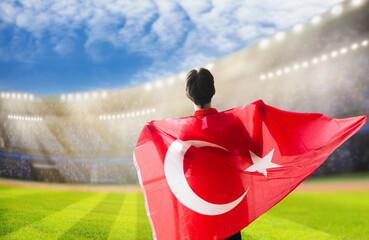 Turkish football team supporter on stadium.