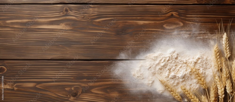 Poster Top view of a wooden table with a sprinkling of wheat flour and ample space for text at the side Original Sprinkled wheat flour on wooden table with empty space for text top view