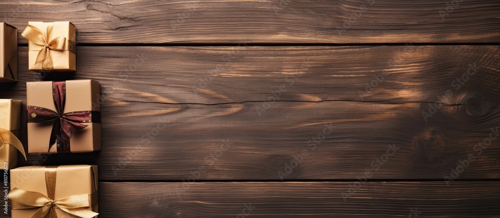 Fototapete Top view of gift boxes on a wooden background with ample space for adding images or text