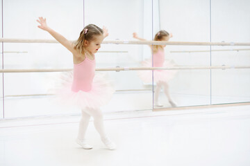 Little ballerina at ballet class