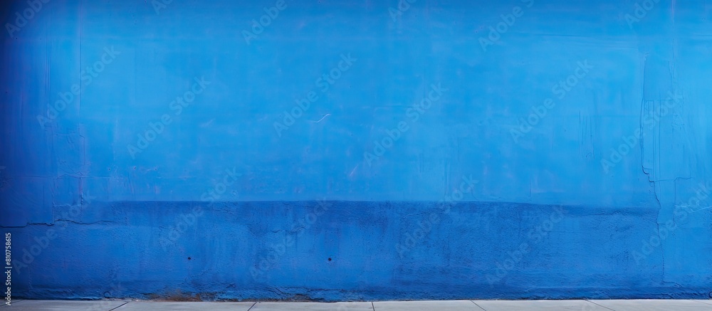 Aufkleber a vibrant blue wall serves as the backdrop allowing for ample space to add images or text