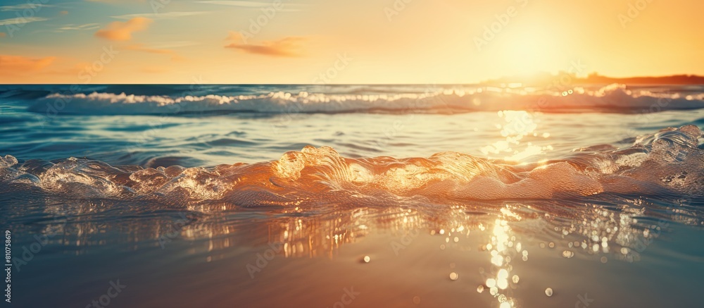 Poster The image features a hazy sunset on a tropical beach with the sunlight creating a bokeh effect on the water It evokes the idea of a summer vacation and travel adventure with a vintage tone filter add