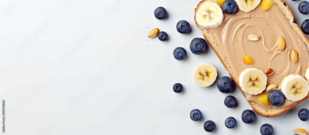 Poster Top view of a peanut butter sandwich with bananas and blueberries providing ample space for text in the image