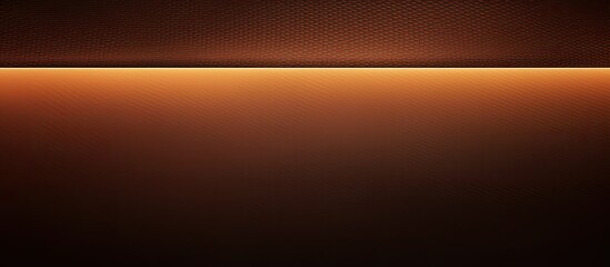 A spotlighted brown carbon texture wallpaper provides a captivating background with ample copy space image