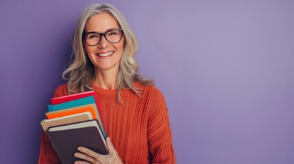 Smiling Woman Holding Colorful Books