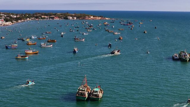 Colorful Fishing Boats In Mui Ne Fishing Village; Slowo Aerial Rotation Revealing The Vibrant Port City Of Phan Thiet, Vietnam.