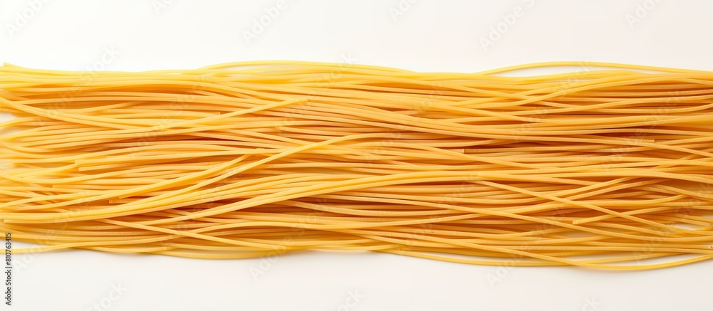 Poster A group of spaghetti noodles arranged on a white background with ample copy space for adding additional images or text