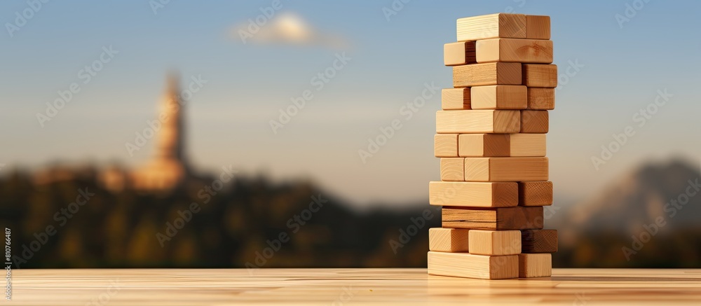 Poster A tower game with a wooden block shown in a copy space image
