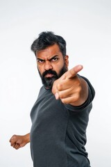 Naklejka premium A bearded man menacingly points forward with his outstretched finger Fictional Character Created By Generative AI. 