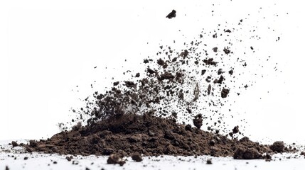 Close-up view of flying soil dirt scattering to form a natural pile, elegantly isolated on a white background with studio lighting