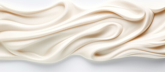 Top view of a tube of hand cream on a white background featuring a squeezed amount of cream The image has copy space