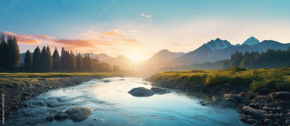 Poster during the golden hour of sunset a picturesque mountain river flows providing a serene backdrop with