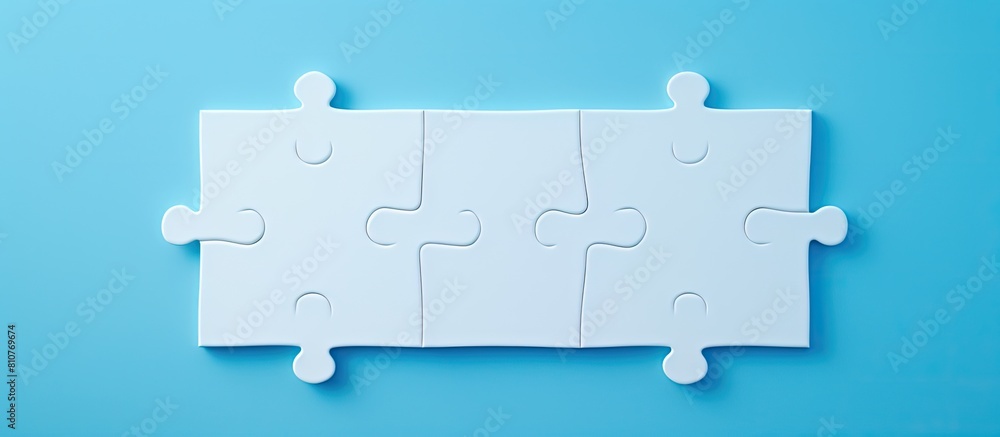 Poster texture photo with copy space image of a folded white jigsaw puzzle on a blue plastic surface