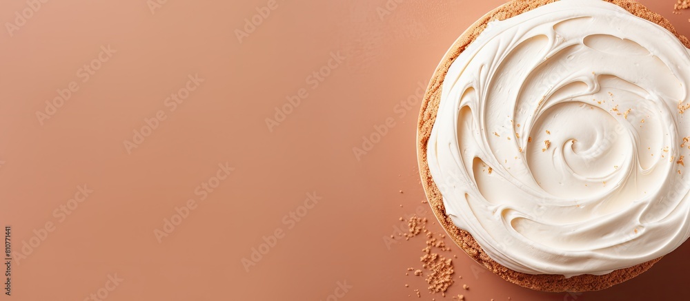 Poster Top view of a cake with creamy frosting set against a food background Perfect for menu concepts with copy space for text