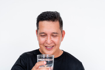 Middle-aged Asian man enjoying a refreshing glass of water, isolated on white