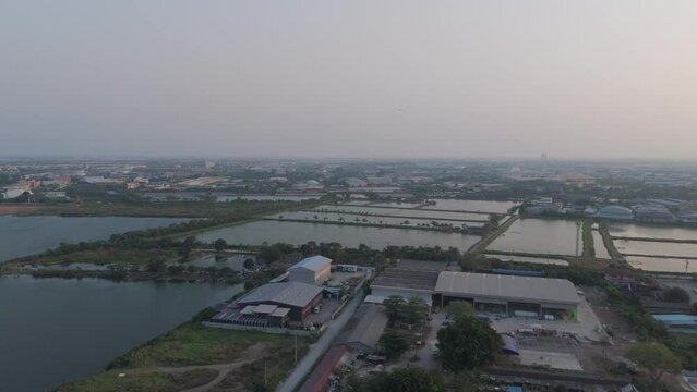 Aerial View landscape water flowing and life of thai people fishery, Aerial Drone View of Sakae Krang River and home villages near the river at Uthai Thani Province in Thailand