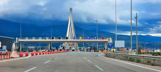 rio antirio bridge greece toll station cords signs patra city