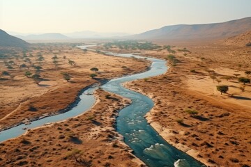 Niger landscape. Aerial View of a Meandering River in a Desert Valley.