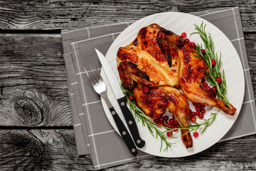 butterflied, spatchcock roast chicken on a plate