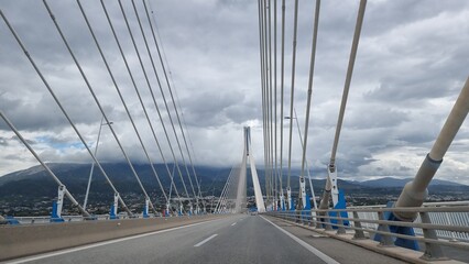 rio antirio bridge greece toll station cords signs patra city