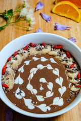  Healthy Raw Cacao chocolate smoothie bowl topping with cacao nibs and cacao granola goji berry...