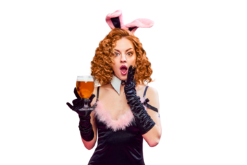 Portrait with adorable, surprised girl, woman wearing bunny costume with ears holding glass of beer against transparent background. Concept of drinks, alcohol, Oktoberfest, festivals, party. Ad
