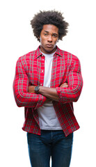 Afro american man over isolated background skeptic and nervous, disapproving expression on face with crossed arms. Negative person.