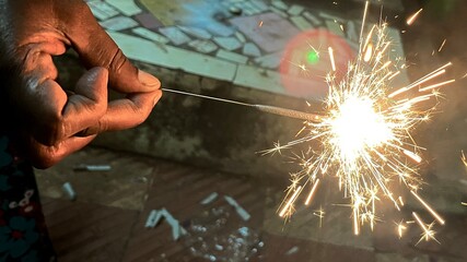 Image of holding a firing sparkle