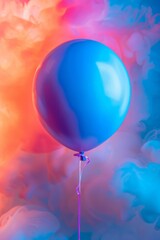 A single blue balloon floating with a pink and blue smoky background creating an artistic effect