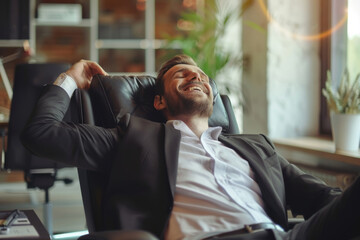 Happy businessman relaxing in a modern home office