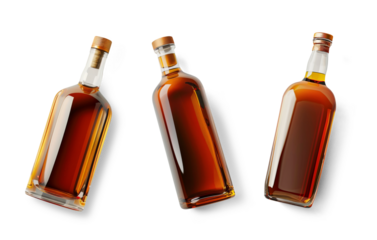 Three glass bottles with liquor, isolated from the white or transparent background