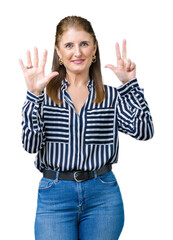 Middle age mature business woman over isolated background showing and pointing up with fingers number eight while smiling confident and happy.