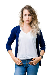 Fototapeta premium Beautiful young blonde woman over isolated background Relaxed with serious expression on face. Simple and natural looking at the camera.