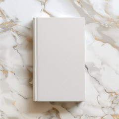 Mockup of a new book with blank beige cover in modern neat style on an abstract white and gold marble background. Square template for social media post for books and advertisement.