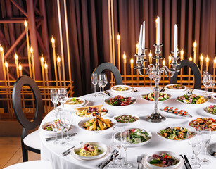 Elegant dinner table setup with candlelight