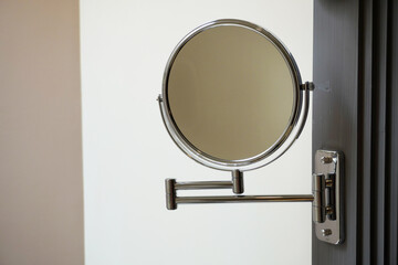 round shape mirror in bathroom